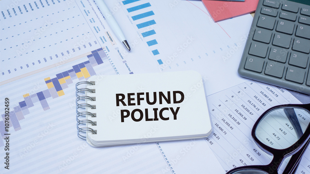 REFUND POLICY word. Concept word REFUND POLICY on notes with diagram charts. Idea for healthcare, typography, medical, business and financial concept. Copy space REFUND POLICY word. Concept word REFUND POLICY on notes with diagram charts. Idea for healthcare, typography, medical, business and financial concept. Copy space