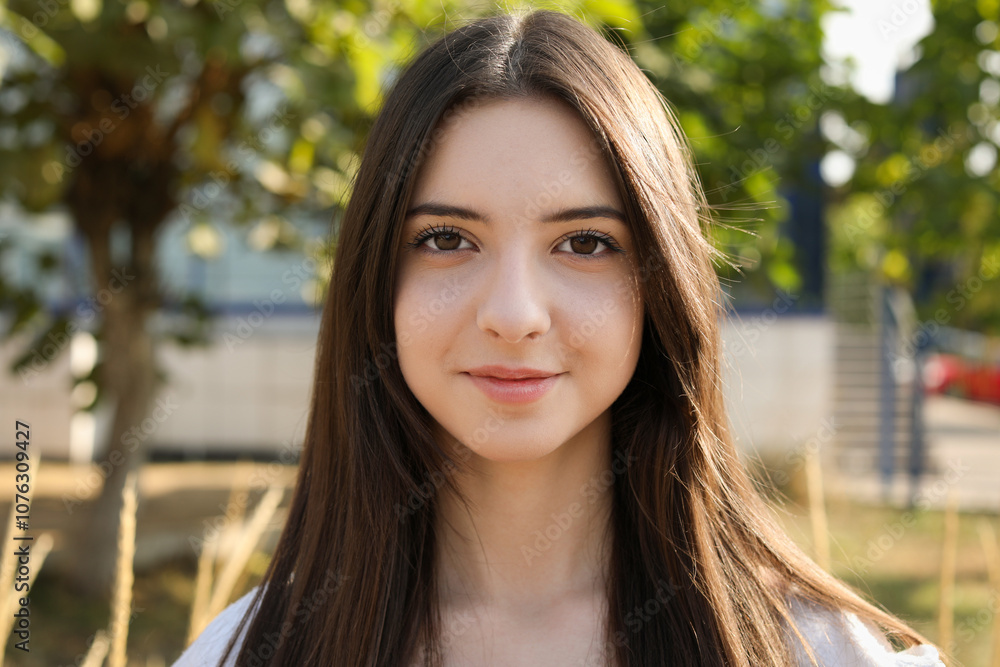 Portrait of beautiful teenage girl on city street Portrait of beautiful teenage girl on city street