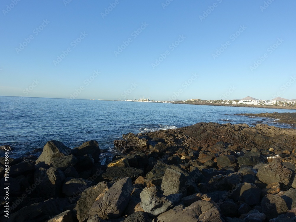Rocky coastline with sea and sky horizon Rocky coastline with sea and sky horizon