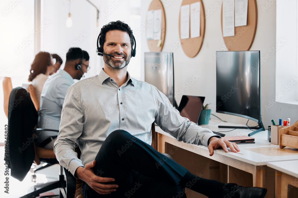 © peopleimages.com - Mature man, happy and portrait at call center with pride, confidence and team with customer service. Person, agent or consultant with smile, mic and crm with voip headset for tech support at agency