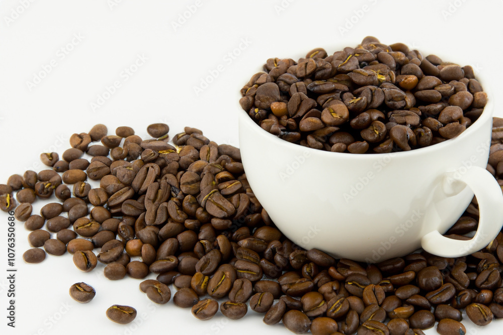 Fototapeta premium Cup of coffee on white . beverage drink concept. white cup of coffee with green beans stands on a white . a man standing on a white with a cup of coffee and beans lifestyle.