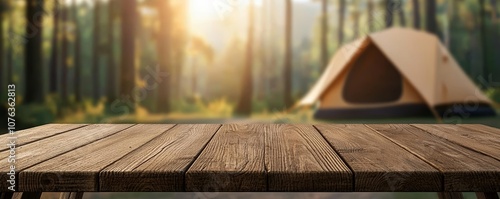 Wooden table in foreground with blurred camping tent and forest in background, warm sunlight filtering through trees, outdoor nature setting, peaceful ambiance photo