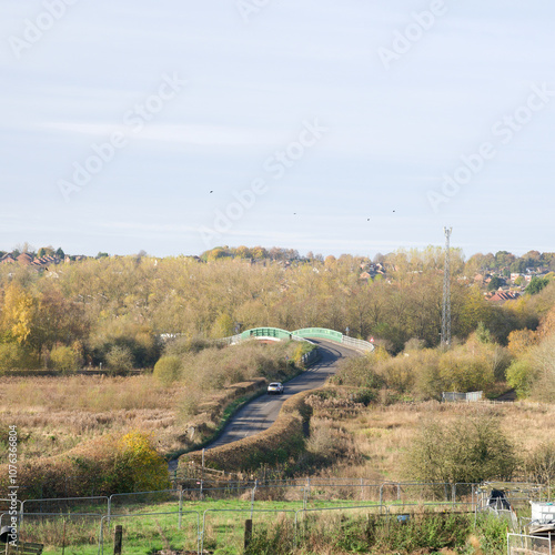 Distant country road and bridge photo