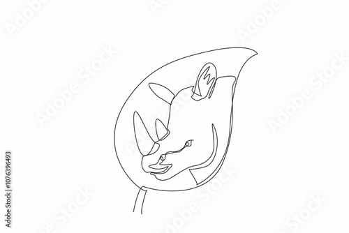 Single one line drawing the rhinoceros head in the middle of the leaf. Let it live in nature. Stop illegal hunting. Natural habitats. World Wildlife Day. Continuous line design graphic illustration