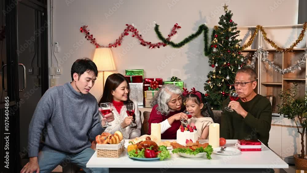 Celebrate Christmas with family in a cozy, festive setting. Santa hats, gifts, and delicious food capture the warmth, joy Celebrate Christmas with family in a cozy, festive setting. Santa hats, gifts, and delicious food capture the warmth, joy