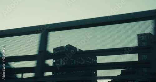 Wallpaper Mural Panning shot from outside car, bus or train window or bicycle on high-rise office corporate buildings in modern neighbourhood in barcode, bjorvika in Oslo, Norway on a moody grey winter day Torontodigital.ca