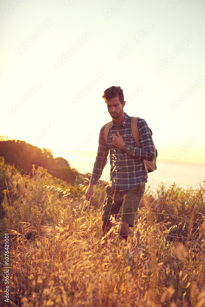 Man, hiking and sunset with mountain, fitness and nature for travel journey and sightseeing. Tourist, backpacker and vacation for outdoor, walking and destination with adventure or summer holiday Man, hiking and sunset with mountain, fitness and nature for travel journey and sightseeing. Tourist, backpacker and vacation for outdoor, walking and destination with adventure or summer holiday