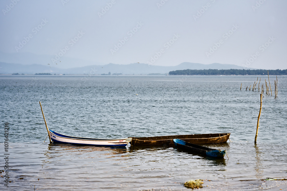 Serenity on the Water: A Lonely Boat in an Inlet
