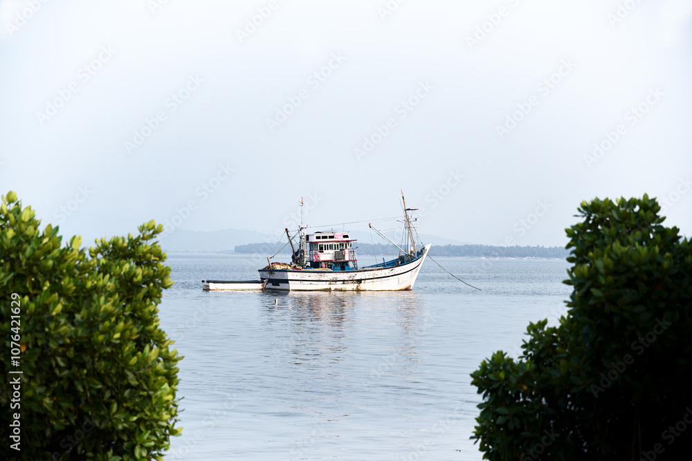 Serenity on the Water: A Lonely Boat in an Inlet