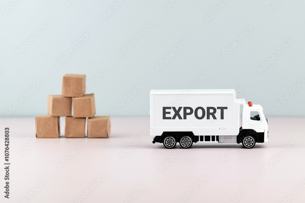 White toy truck on blocks with the text EXPORT. White toy truck on blocks with the text EXPORT.