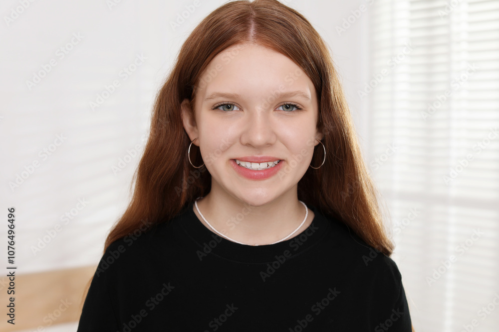 Portrait of happy teenage girl at home Portrait of happy teenage girl at home