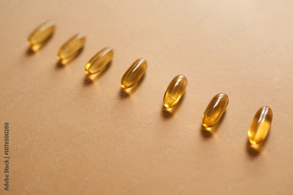 Row, gel and medicine with pills for health with supplements, medical nutrition and prescription. Drugs, tablets and omega 3 with healthcare, vitamin diet and treatment capsule on studio background Row, gel and medicine with pills for health with supplements, medical nutrition and prescription. Drugs, tablets and omega 3 with healthcare, vitamin diet and treatment capsule on studio background