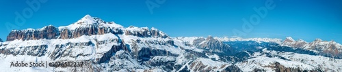Obraz na płótnie Dolomites in Italy. Wide panorama with Sella group mountain massif in winter. Famous ski and snowboard region with popular resorts around and famous Sella Ronda ski trail carousel around Sella w salonie