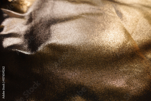 Fotografija Close shot of shiny bronze nylon and spandex lame fabric