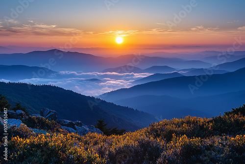 Beautiful sunset over misty mountains with vibrant colors