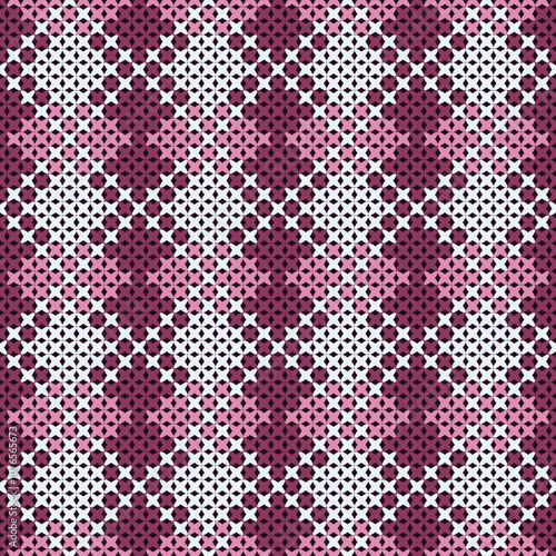 Crochet repeating pattern with a purple and white color scheme. The pattern consists of small dots arranged in a grid-like formation, creating a textured and geometric effect.