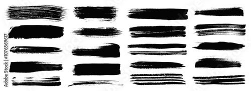 Artistic set of hand painted isolated black ink textured grunge brush strokes and lines. Abstract unique paintbrush textures and scratches for graphic design, decoration, texture