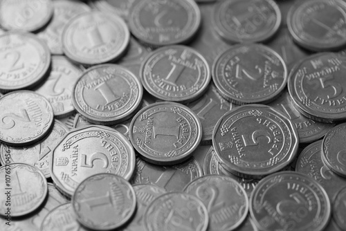 Ukrainian money, exchange coin, white coins of different denomination in random order. photo