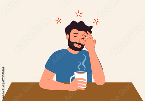 Exhausted young man sit at table drink coffee feel fatigue or drowsiness. Tired guy suffer from overwork lack energy need caffeine. Overwhelmed with work.