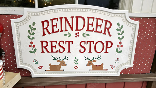 Reindeer Rest Stop sign with festive decorations on a cozy holiday background