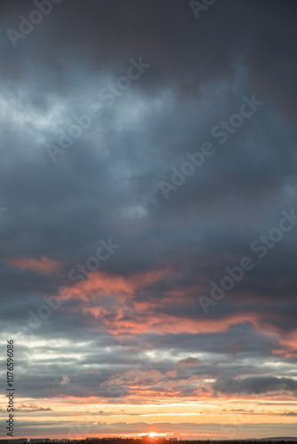 Beautiful skyscape with clouds at sunrise