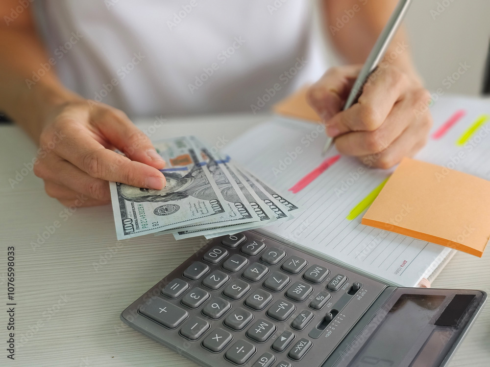 Woman freelancer planning financial budget Woman freelancer planning financial budget