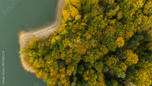 Vibrant Autumn Drone View of Solina Lake and Bieszczady Mountain