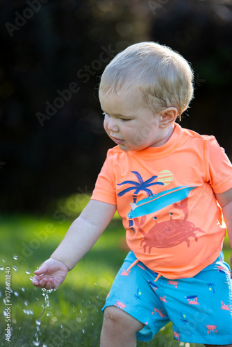 child playing with water