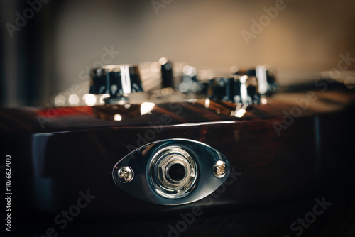 Electric guitar bridge, strings and pickup detail close-up