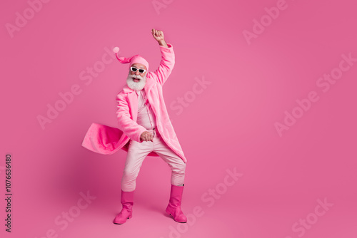 Photo of optimistic cheerful funky carefree retired man jumping rodeo cowboy ranch isolated on pink color background