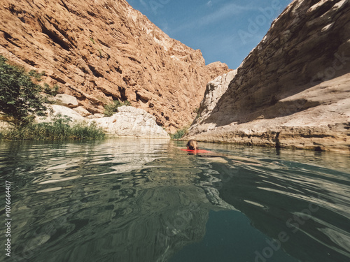 Wadi Shab, very popular wadi in the Al Sharqiyah Region in Oman with water fall in the cave, swimming in natural pools, leisurely walk leisurelywalwalk to the entrance of the wadi.