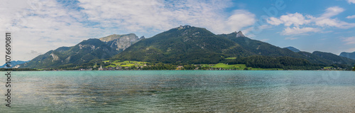 landscape with Lake Wolfgangsee, mountain Schafberg, Reiningspitz, Teufelhaus, Vormauerstein and the town of Sankt Wolfgang, Austria