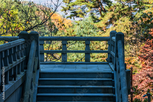 stone stairway in the Buddhist temple on the autumn mountain photo