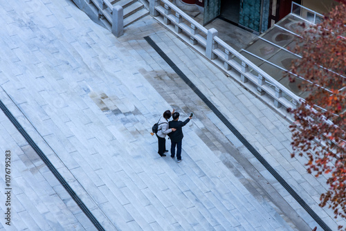 high-angle view of the tourists in the Buddhist temple photo