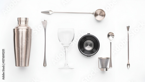 Flat lay with bartender tools for mixology and cocktail making, such as shaker,mixing glass, stirring spoon, jigger and filter. photo