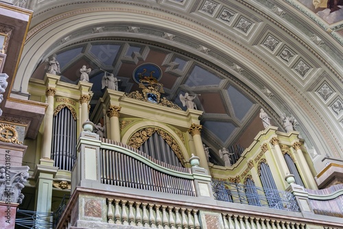 Eger, Hungary May, 18 2024. Pipe organ in Cathedral Basilica of St. John the Apostle. Interior of the Eger Basilica. Indoor details of Catholic Church in Europe. photo