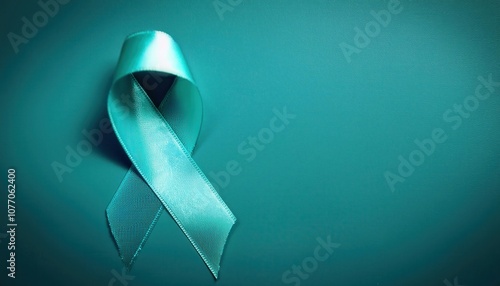 Teal Ribbon Symbolizing Awareness and Support for Cervical and Ovarian Cancer. Highlighting Women's Health Advocacy, Early Detection, Prevention, and Global Solidarity Against Gynecological Cancers photo