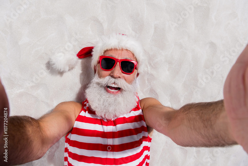 High angle photo of funny santa claus wear swimsuit sunglass lying sandy beach summer trip isolated on white background