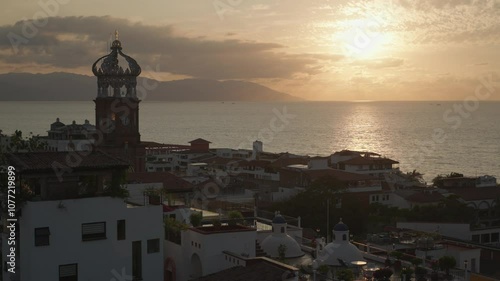 View from Faro de Matamoros Lighthouse in Colonia Centro, beach and sunset in the background Puerto Vallarta, Jalisco, Mexico photo