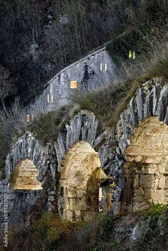 Obraz na płótnie Tagliata della Scala: Illuminated arches of the 19th-century fortress. Primolano, Veneto, Italy. w salonie