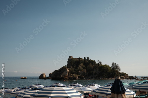 View of the beach Isola Bella in Sicily photo