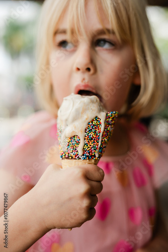 Girl eating icecream photo