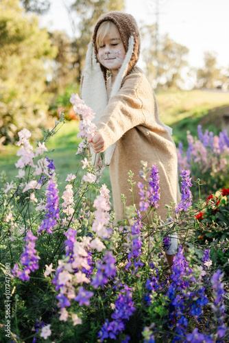 Little girl in a bunny costume photo