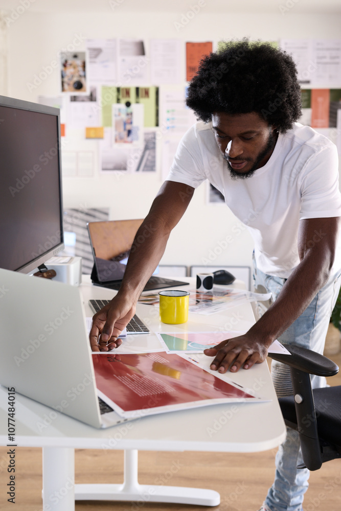 Designer Attentively Organizing Project Layouts Designer Attentively Organizing Project Layouts