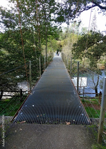 Pasarela  metálica sobre un río de Galicia photo