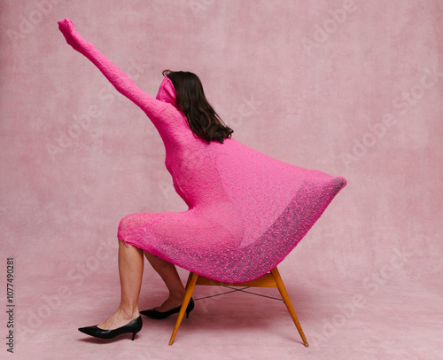 Unique Artistic Expression in Bold Pink Fashion Design photo