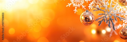 orange christmas background with snowflakes and christmas balls 