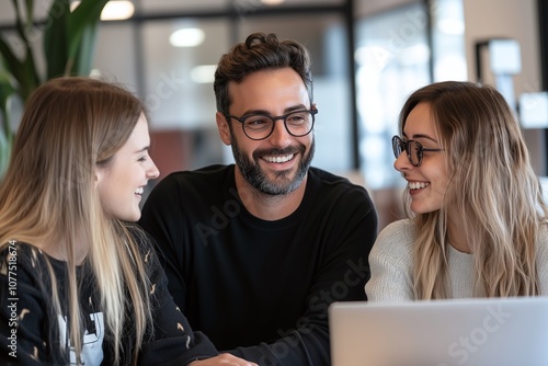 Friends Collaborate and Laugh in a Modern Workspace