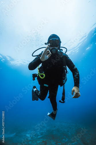 Wallpaper Mural young scuba diver says ok Torontodigital.ca