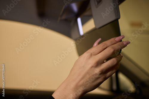 The modern car interior features a sleek vanity mirror that highlights both functionality and style